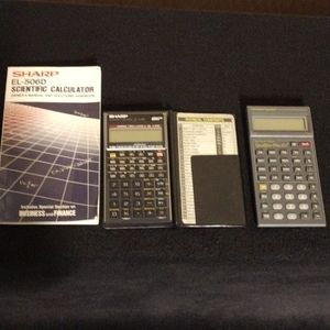 Sharp EL-506D scientific calculator with manual